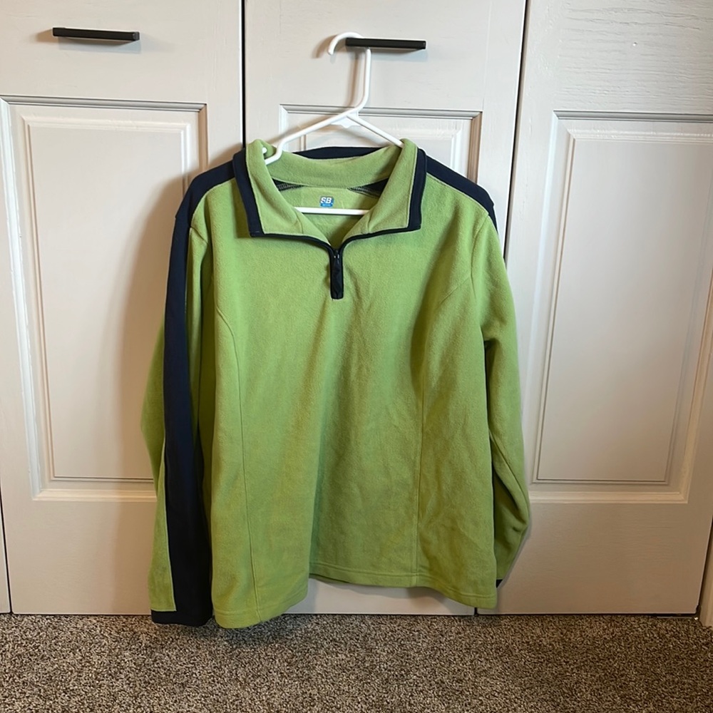 Green pullover.